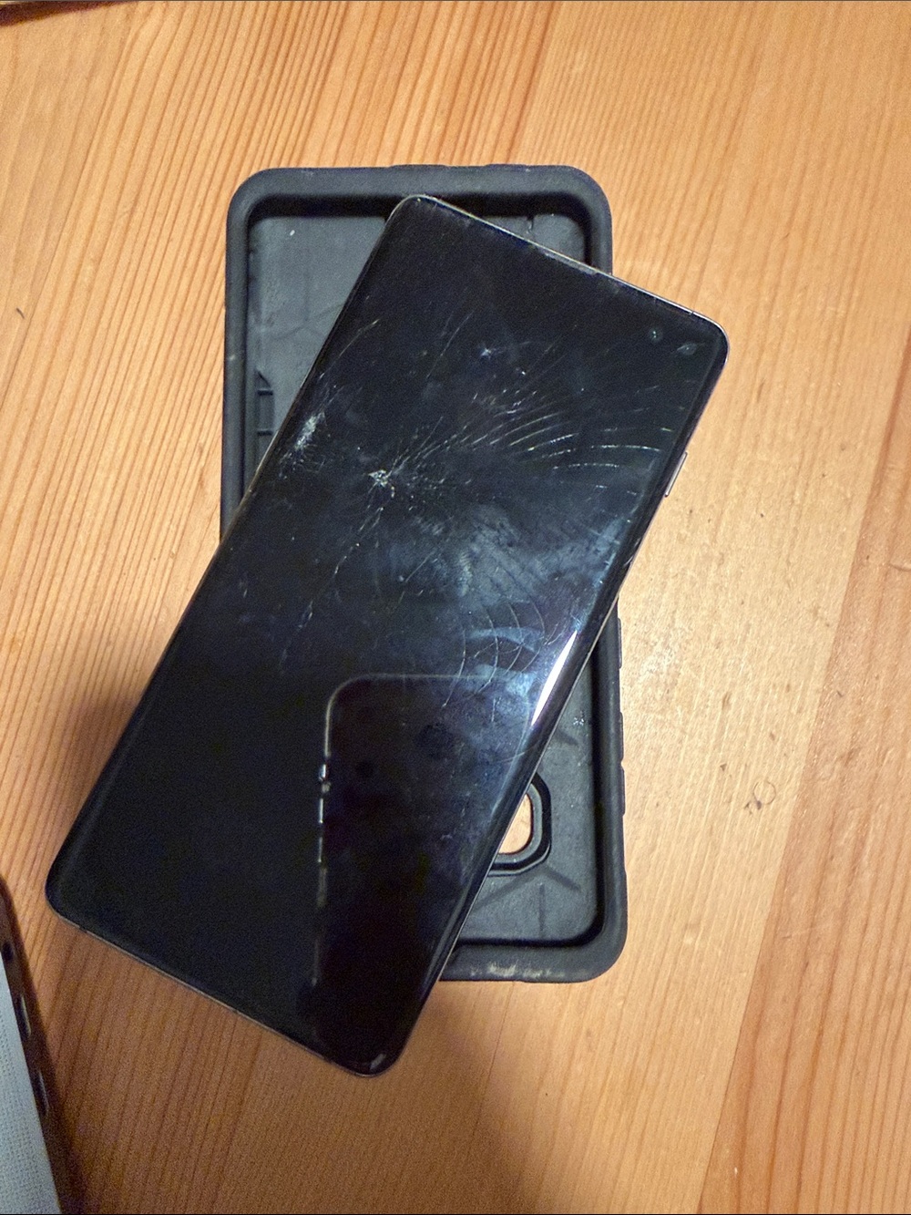 Black Smartphone with Black Protective Case for parts